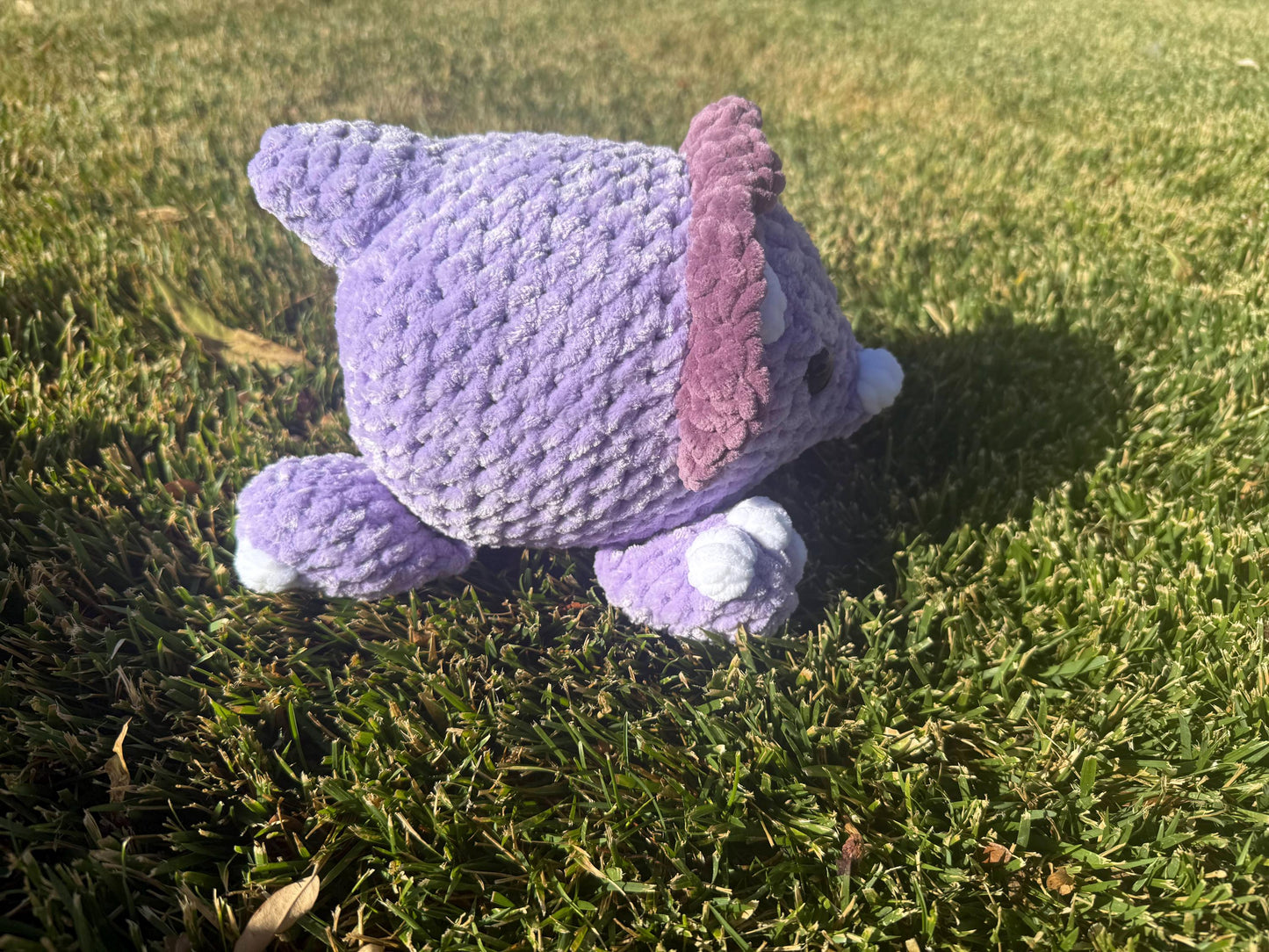 Crochet Triceratops Plushie Splooting