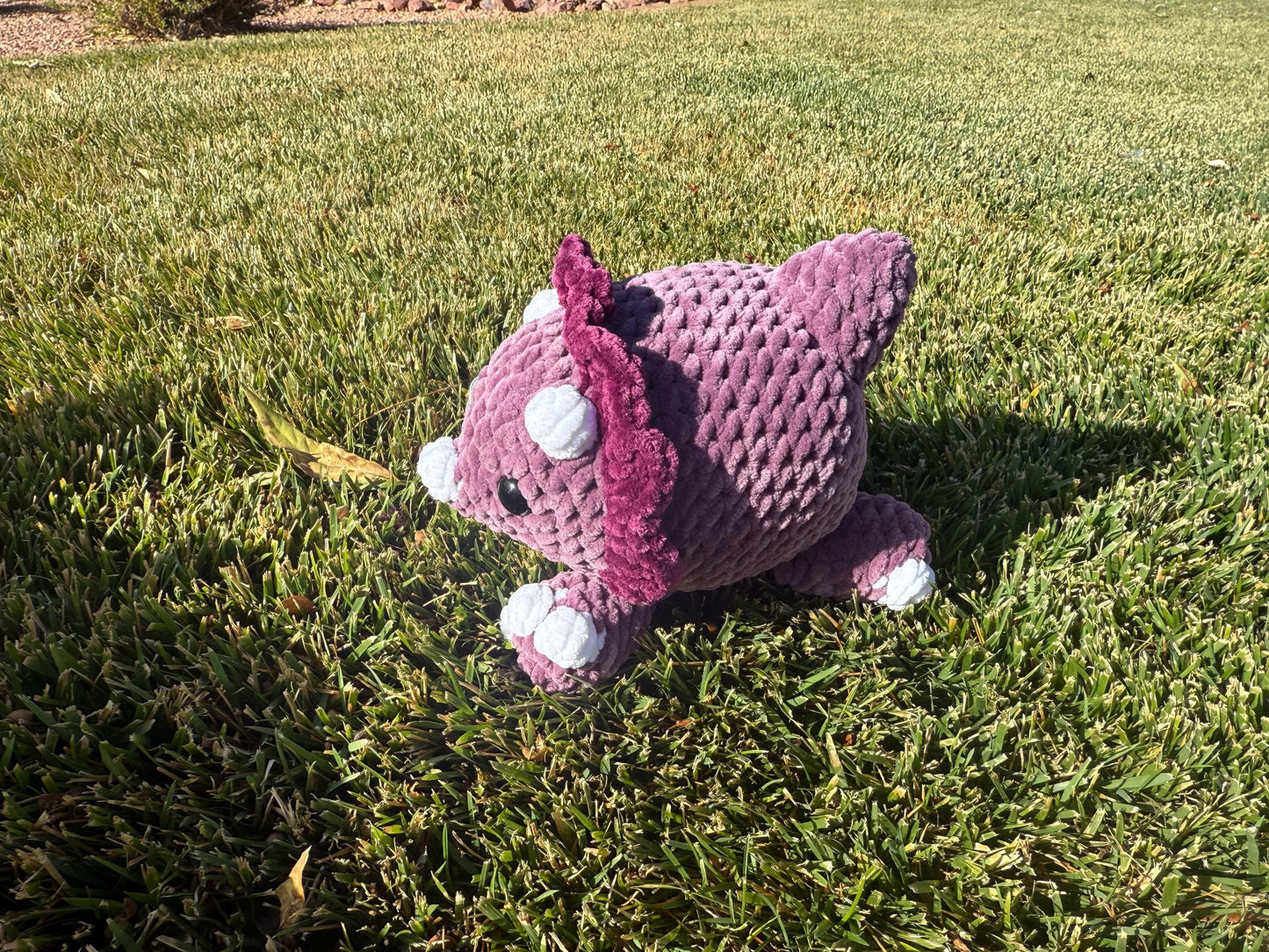 Crochet Triceratops Plushie Splooting